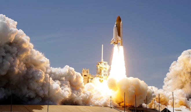 Space shuttle Atlantis lifts-off from the Kennedy Space Center at Cape Canaveral, Fla. Friday May 14, 2010. Atlantis' 12-day mission will deliver a Russian built storage and docking module to the International Space Station. (AP Photo/John Raoux)