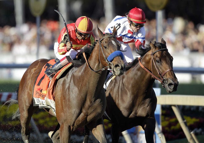 Lookin At Lucky, left, ridden by Martin Garcia, outlasts First Dude to win the 135th Preakness Stakes at Pimlico.