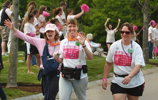 Participants in the Avon Walk for Breast Cancer finish their first day at the Reebok headquarters in Canton, where many camped. From left are Jane Lundquist of Milton, Eve Kavaliauskas of Somerset and Bernie Ganiono of Saugus.