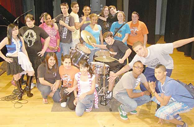 Participants in tonight's talent show at Kewanee High School gather on stage for a group photo.
