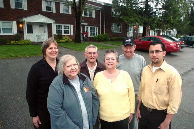 Fieldside Gardens condominium trustees say some unit owners at the Brockton complex were overcharged. From left are Kathy Jewett, Susan Doyle, Howard Cupples, Sandra Brown, Ron Davis and Erik Mora.