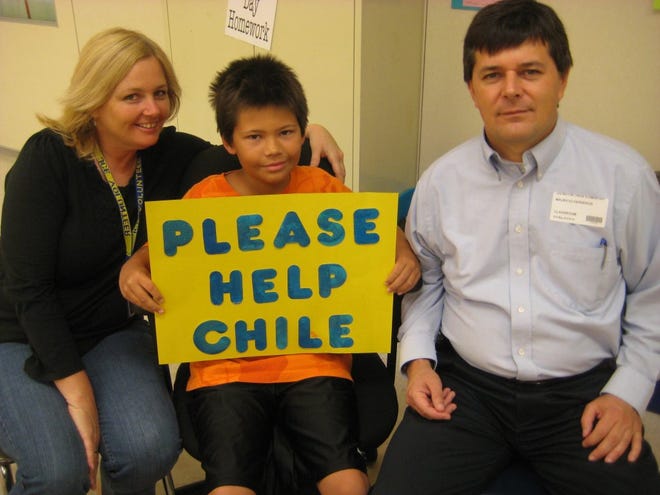 Lorraine and Mauricio Herreros worked with their son Jonathan's Julington Creek Elementary School fourth-grade class to collect warm clothing for Chileans affected by the recent earthquake.