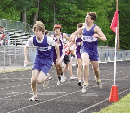 Kennebunk’s Ian Howland, left, takes the baton from teammate Nick Cabral during the 1600 relay at Monday’s track meet at Kennebunk.

Carl Pepin photo