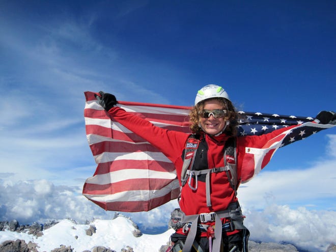 In this Sept. 1, 2009 file photo provided by the Romero family, Jordan Romero, 13, poses at the Carstensz Pyramid summit, Oceania's highest peak at 16,024 feet, making Jordan the youngest person to summit. Romero, a 13-year-old American boy has become the youngest climber to reach the top of Mount Everest. A spokesman for Romero says the boy's team called by satellite phone from the summit of the world's highest peak on Saturday, May 22, 2010.