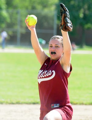 Millis' Hillary McBride delivers a pitch against Bellingham during high school softball 5/21/10 in Millis.
