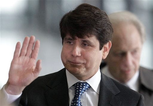 In this April 21, 2009 file photo, ousted Illinois Gov. Rod Blagojevich leaves federal court in Chicago. (AP Photo/M. Spencer Green, File)