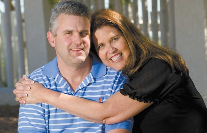 Brett Macchietto poses with his wife, Lynn Spradley Macchietto.