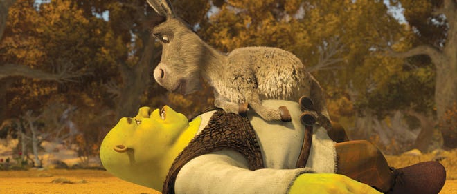 After signing a deal with a shady trickster, the ogre Shrek (with voice of Mike Myers), bottom, finds himself in an unrecognizable Far Far Away and face-to-face with Donkey, who no longer recognizes him in ?Shrek Forever After.?