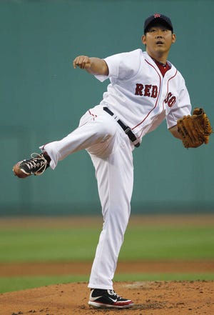 Red Sox starter Daisuke Matsuzaka follows through in the first inning.