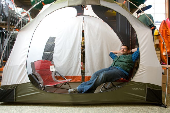 Chris Hark, Assistant Store Manager at REI in Hingham, inside an REI Kingdom 4 tent on May 21, 2010.