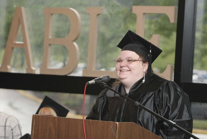 Honored ABLE graduate LaTasha Law delivers her address during the commencement ceremony at Washington High School on Tuesday.