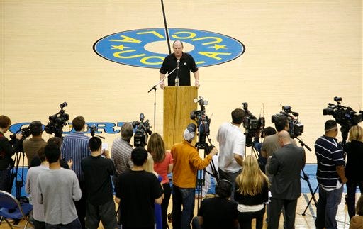 UCLA head basketball coach Ben Howland speaks about the passing of coach John Wooden during a press conference at Pauley Pavilion in Los Angeles, Friday, June 4, 2010.