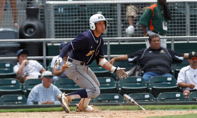Florida International University's Garrett Wittels extends his hitting 
streak to 55 games with a sixth-inning double Friday during an NCAA region 
tournament game against Texas A&M in Coral Gables.ASSOCIATED PRESS / J PAT 
CARTER