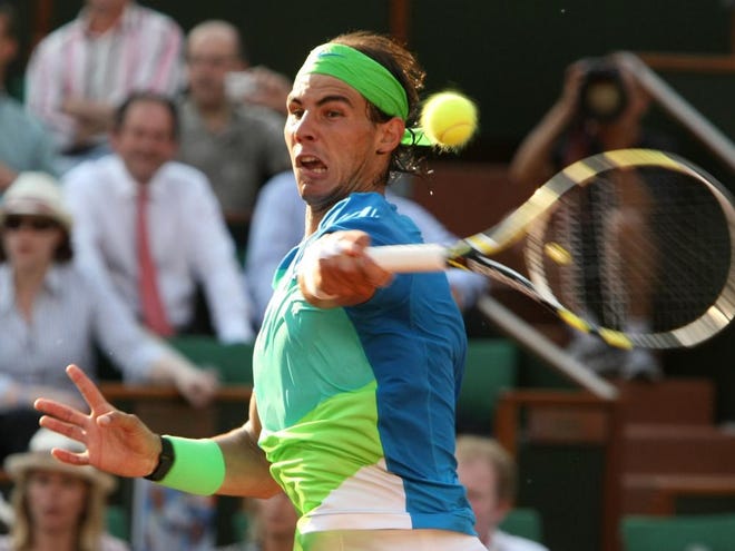 Spain's Rafael Nadal returns the ball to Austria's Jurgen Melzer during their semifinal match at the French Open tennis tournament at the Roland Garros stadium in Paris, Friday.