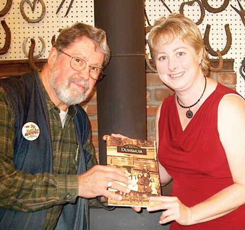 Ron McCloud and Deborah Harton, co-authors of the book "Dunsmuir," had only one disagreement during its creation: who gets top billing? Harton said he should get it because he was so much a part of town; he said she should because it began with her, and her work in the field drove it home. He won.