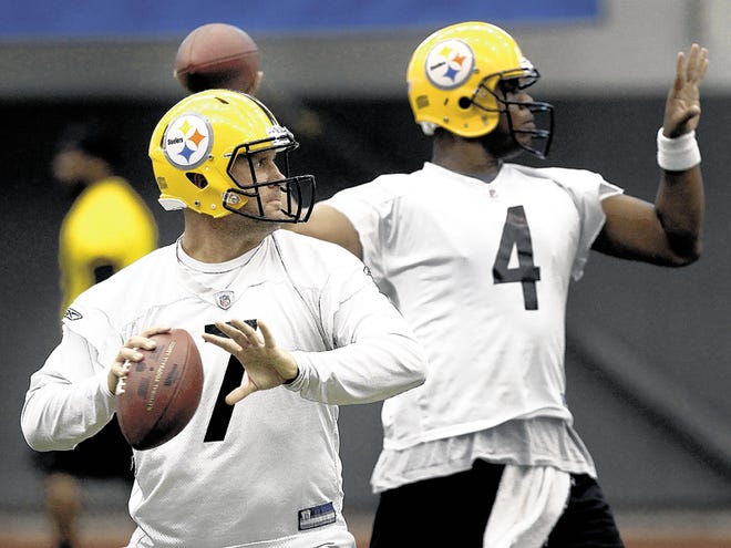Pittsburgh Steelers quarterback Ben Roethlisberger (7) and Byron Leftwich (4) throw during a training session in the NFL football team's indoor practice facility in Pittsburgh, Wednesday, June 9, 2010.