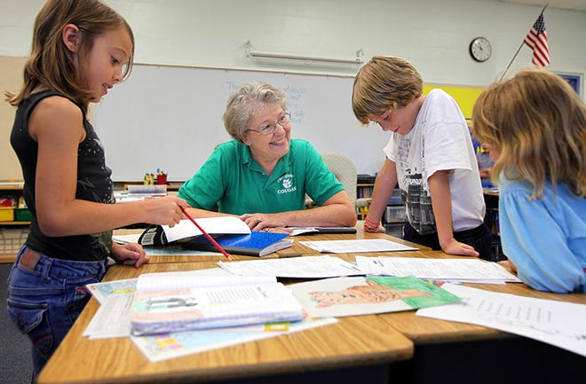 Linda Allen teaches students in her second-grade class at Crookshank Elementary during the last day of school Wednesday. After 36 years of teaching, Allen is retiring this year. By DARON DEAN, daron.dean@staugustine.com