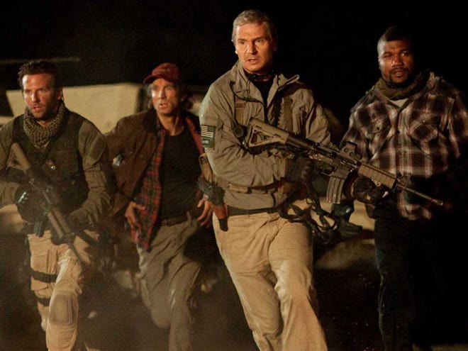 Left to right: Face (Bradley Cooper), Murdock (Sharlto Copley), Hannibal (Liam Neeson) and B.A. (Quinton “Rampage” Jackson) race into action in a scene from "The A Team."