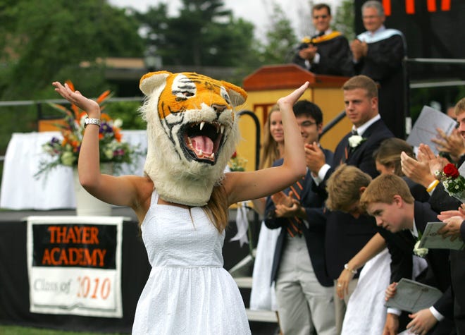Senior speaker Grace Curley dons her mascot costume one last time during Thayer Academy's graduation on June 12, 2010 in Braintree.