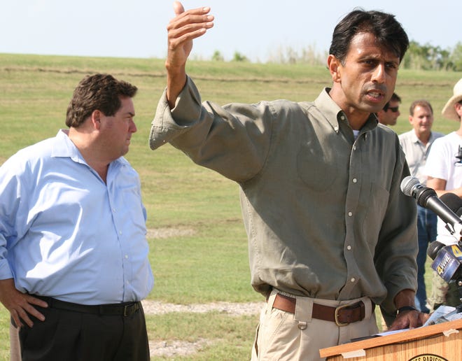 Gov. Bobby Jindal announced Friday that the U.S. Army Corps of Engineers has approved dredging that will provide material to construct sand berms around barrier islands threatened by oil from the BP spill. Parish President Billy Nungesser looks on during a news conferences at Ft. Jackson in lower Plaquemine Parish.