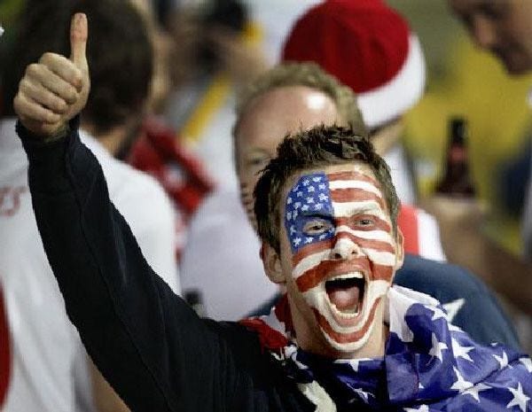 A United States fan cheers before the World Cup Group C soccer match between England and the United States at Royal Bafokeng Stadium in Rustenburg, South Africa, Saturday.