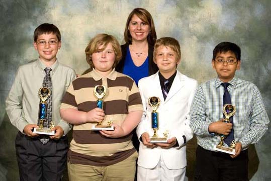 Fairforest Elementary School teacher Stephanie Wofford with her S.C. Stock Market Game winning team. From left, Andrew Davison, Thomas Cunningham, Mark Kozariz and Parthak Patel took third place in the spring elementary school competition that was sponsored by the S.C. Council on Economic Education
