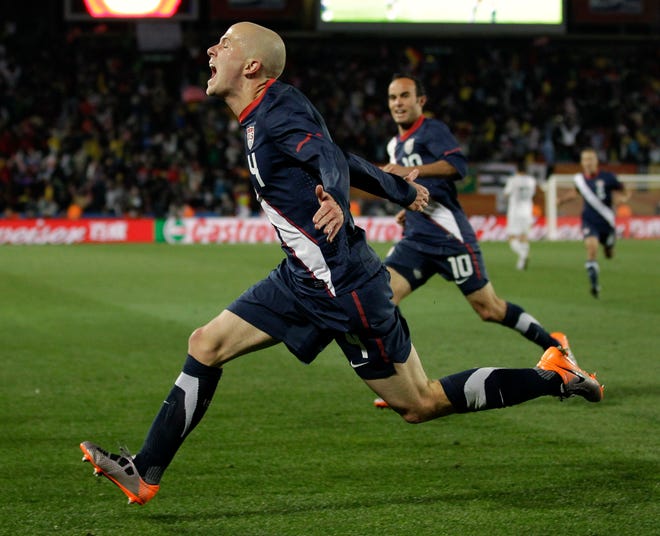 United States' Michael Bradley, foreground, celebrates next to United States' Landon Donovan, back, after scoring a goal during the World Cup group C soccer match between Slovenia and the United States at Ellis Park Stadium in Johannesburg, South Africa, Friday. The match ended in a 2-2 draw.