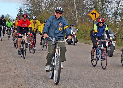 80-year-old Harold Mohr, of Sugar Island, helps lead the Memorial Ride before the start of the Tag Time Trial on May 15 in Kinross. Mohr was the oldest participant in the Time Trial which raised funds for the Lance Armstrong Cancer Foundation.