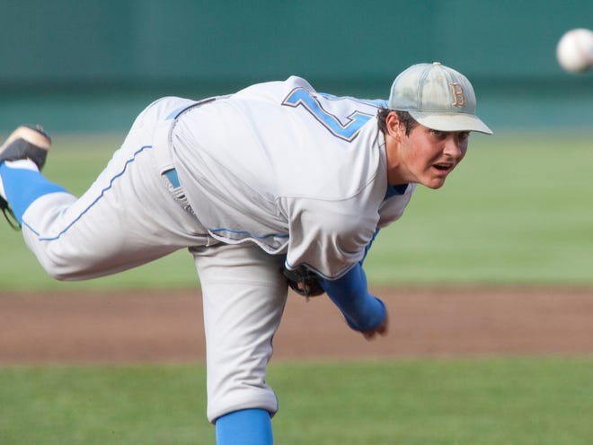 UCLA's starting pitcher Trevor Bauer delivers against Florida in the first inning Saturday in Omaha, Neb.