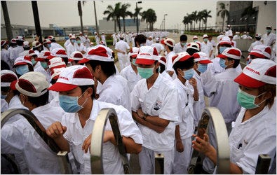 Honda workers at an auto parts factory in Zhongshan, China, gathered near the factory gates during their strike last month.