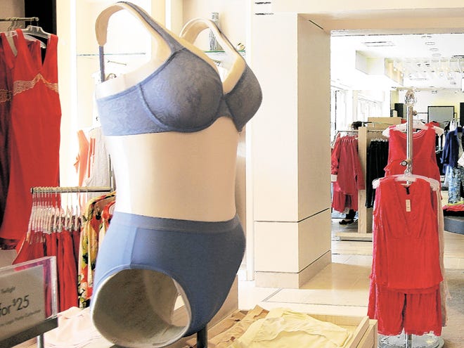 This file photo taken May 2, 2005, shows women's lingerie on display in Houston. American women spent $5.7 billion on more than 425 million bras in 2009, according to market research from The NPD Group. And experts estimate half of those undergarments - which can cost anywhere from $5 to nearly $200 - go unworn within months because of wear and tear.