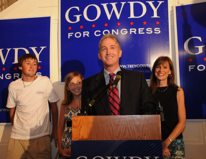 Republican candidate for Congress, Trey Gowdy, with son, Watson, 17; daughter Abigail, 13; and wife, Terri, celebrate his runoff victory against Bob Inglis at the Chapman Cultural Center in Spartanburg, which was packed with supporters.