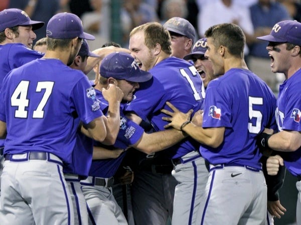TCU players mob Matt Curry (17) after he hit the go-ahead grand slam against Florida State in the eighth inning of an NCAA College World Series baseball elimination game in Omaha, Neb., Wednesday, June 23, 2010.