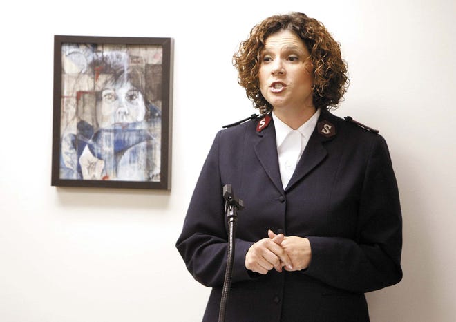 Massillon Salvation Army Capt. Tawny Cowen-
Zanders delivers her address Wednesday 
on human trafficking in the Fred Silk Room of the Massillon Museum.