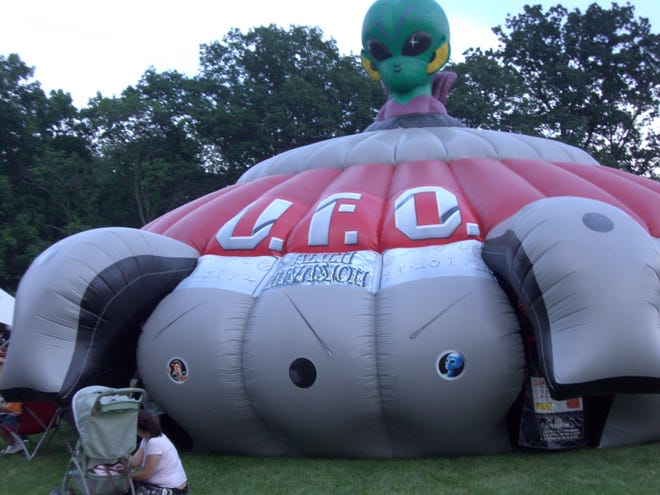 Don’t call the “Men in Black,” from the alien-fighting movie. This inflated alien in his spaceship is only an inflatable that contains laser tag, a popular game at Saturday’s fourth annual FreedomFest in Green’s Boettler Park.
