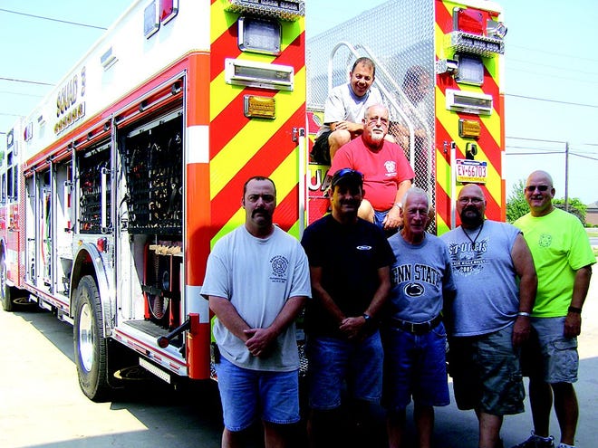 Rescue Hose Company No. 1 took delivery of a 2010 Squad 3 last week. Members of the apparatus planning committee included, at top, Mike Luger and Bill Shatzer, and from left, JR Koons, Wayne Singhas, Don Eshleman, Jeff Williams and fire chief Kevin Barnes.