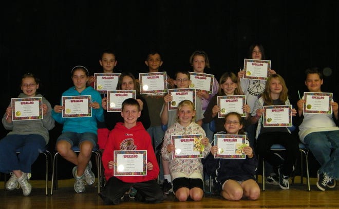 Congratulations to the 14 Whitin Middle School Grade 5 Spelling Bee finalists, who competed first in their homerooms. Winners include the top three finalists, kneeling in the front row from left to right Tyler Miller, second place; Jennifer Hunter, first place; and Emily Ekberg, third place. The other 11 finalists are pictured as well.