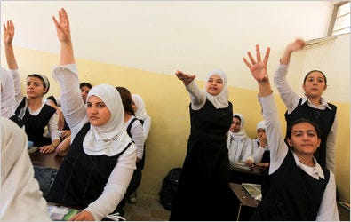 Students at a girls’ secondary school in Baghdad. Politics and sectarian differences hamper the task of revising the history curriculum for a democratic Iraq.