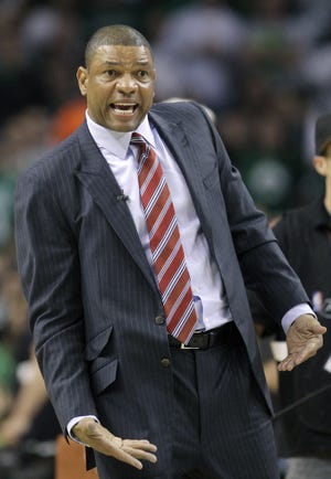 Doc Rivers will return to the Celtics bench for at least one more season.