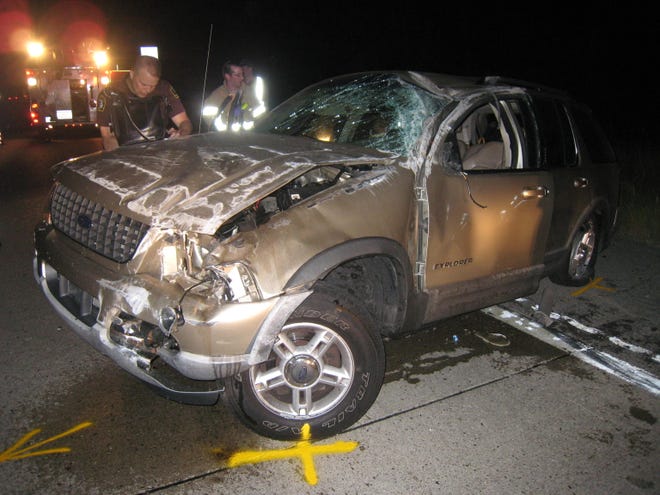 Ionia County Sheriff’s Office deputies investigate on scene a roll-over accident that occurred early Monday morning.