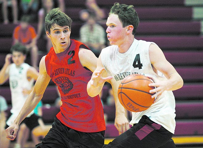 Team South's Scott Hammond, left, puts strong defense on North's Tanner Schreck as he brings the ball upcourt Saturday afternoon in the 2009 Review Atlas Senior Shootout held at Glennie Gymnasium at Monmouth College. (Photo courtesy of Bill Gaither / Bill Gaither Photography)