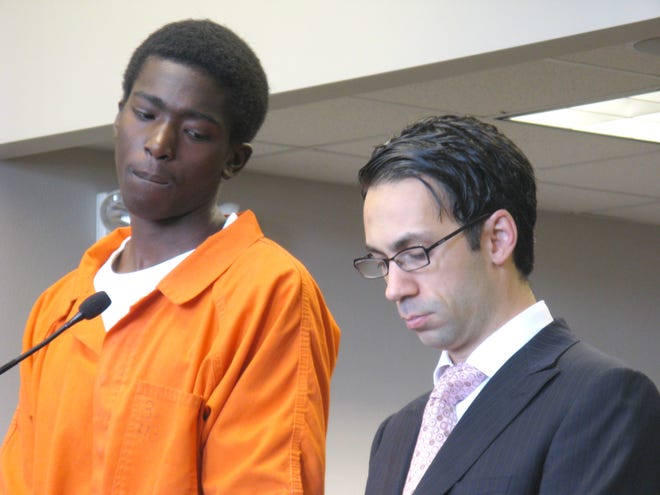 Trevon Patterson, 19, left, stands alongside attorney Christopher Pelli in Oneida County Court Monday, July 12, 2010, as he rejects a plea offer in the Nov. 25, 2009, shooting death of George Garrow, 66, on Dudley Avenue.