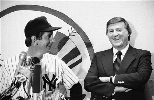 This June 29, 1978, file photo shows New York Yankees principle owner George Steinbrenner laughing as Billy Martin answers reporters questions at a news conference after the Old Timers Day game, at Yankee Stadium in New York. A person close to George Steinbrenner says the Yankees owner died Tuesday morning, July 13, 2010.