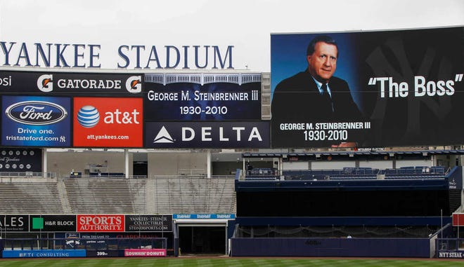 A sign commemorating New York Yankees principal owner George M. Steinbrenner is seen inside Yankee Stadium in New York, Tuesday, July 13, 2010. Steinbrenner , 80, died early Tuesday in Tampa, Fla. (AP Photo/Kathy Willens)