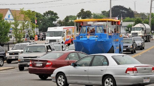 A Cape Cod Duckmobile stops at a red light on Main Street in Hyannis yesterday. The last incident involving a Hyannis duck boat occurred a dozen years ago, when a woman crashed her car into the side of a duck boat, according to Duckmobile's owner, Jon Britton.