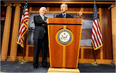 Senators Christopher J. Dodd and Harry Reid and after the bill was passed.