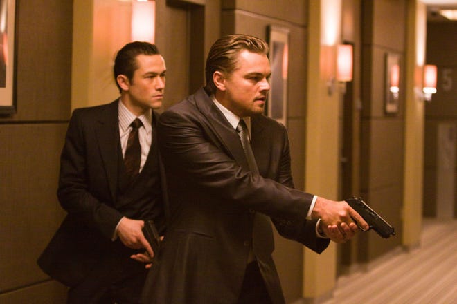 Joseph Gordon-Levitt is Arthur, left, and Leonardo DiCaprio is Cobb in "Inception," a Warner Bros. Pictures release.
