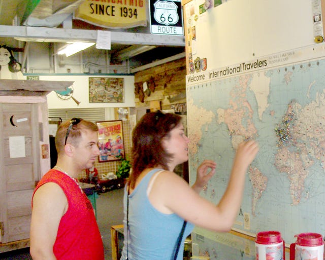 PHOTO COURTESY PAUL CHASSEY Visitors at the CA Rte 66 Museum in Victorville pin the map were they came from this week. About 30 exchange students from France made the Museum their first stop in the USA. The museum recently took in a 85 visitors in a single day.