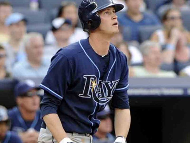 Tampa Bay's Reid Brignac watches his three-run homer in the fifth inning Saturday against the Yankees.