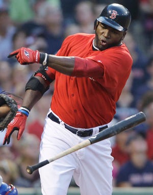 David Ortiz flings his bat after making an out on Friday against the Rangers.